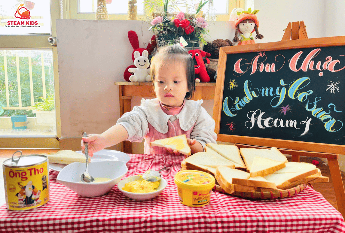 ẨM THỰC: “BÁNH MÌ BƠ SỮA” ẨM THỰC: “BÁNH MÌ BƠ SỮA” - Trường Mầm Non STEAM KIDS