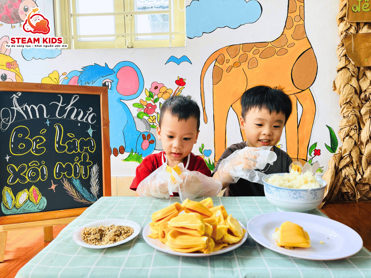 ẨM THỰC CỦA BÉ – KHÉO TAY LÀM MÓN XÔI MÍT NGON ƠI LÀ NGON ẨM THỰC CỦA BÉ – KHÉO TAY LÀM MÓN XÔI MÍT NGON ƠI LÀ NGON - Trường Mầm Non STEAM KIDS